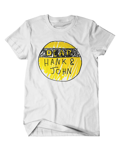 A mockup of an off-white t-shirt with a design featuring a hand drawn yellow and black Dear Hank & John logo.