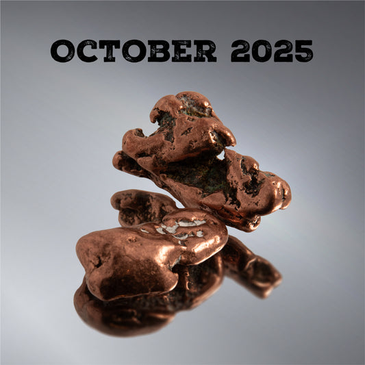 A photo of copper with text overlay that reads "October 2025"