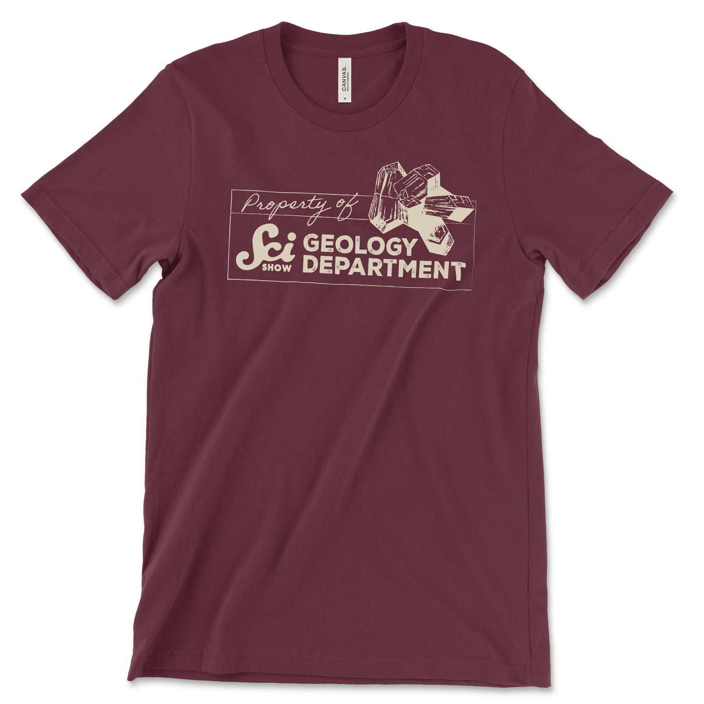 A mockup of a maroon shirt with a cream-colored design on it that shows a rock and reads "Property of SciShow Geology Department"